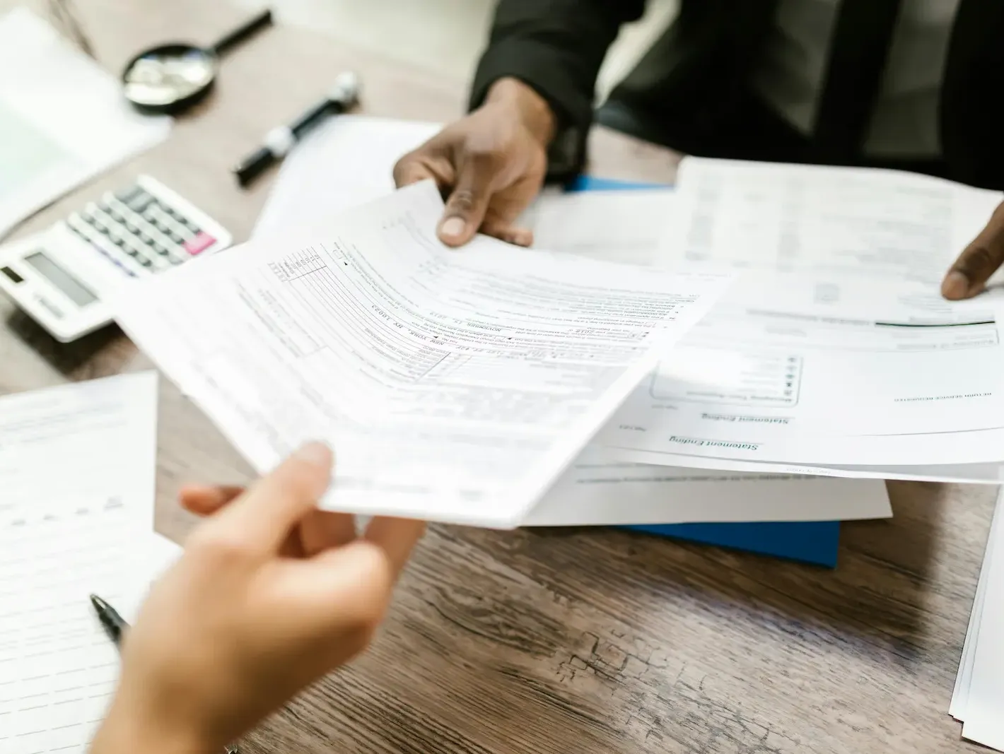 Tax documents and review paperwork — determining income for child support in Alberta